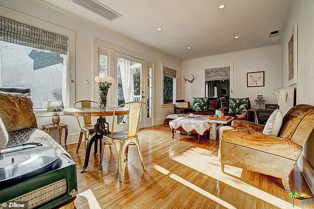 The living room and dining room of the house