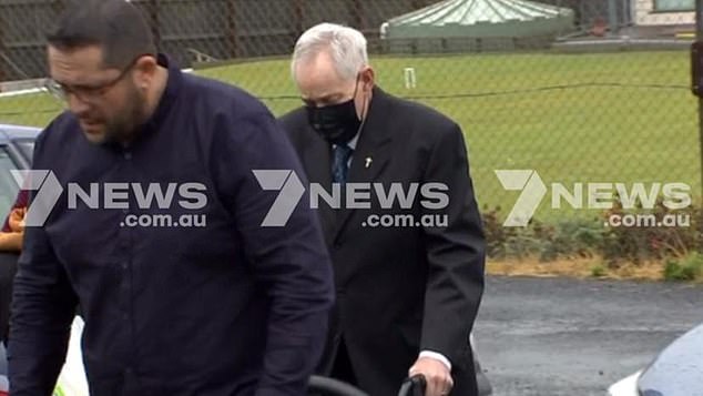 Ian Wilkinson is seen attending his wife Heather's memorial service on Wednesday