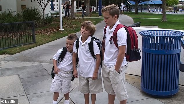 Having fun?  Another video showed a proud Victoria taking her sons for their first day of school