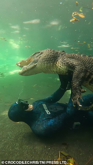 Chris holds Casper at the Everglades Outpost