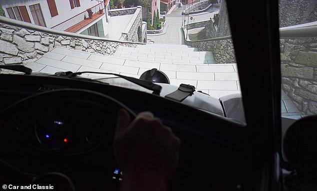 A built-in projector beams scenes from the famous car chase from the 1960s film.  Alternatively, you can control the latest PC games from the mini simulator