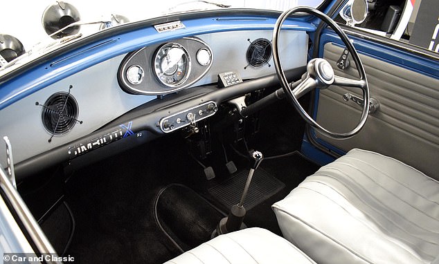 The interior of the car has been fully restored and the controls – including the pedal box – are all original Mini parts