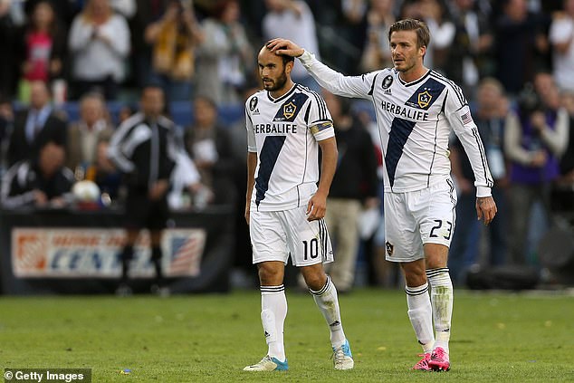 Donovan and Beckham are pictured together in the 2012 MLS Cup against Houston Dynamo