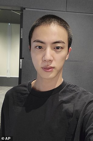 BTS member Jin was spotted in a social media shot last year as he prepared for his military training