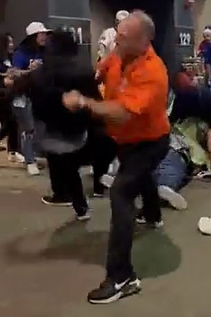 A Giants fan was thrown to the ground by security