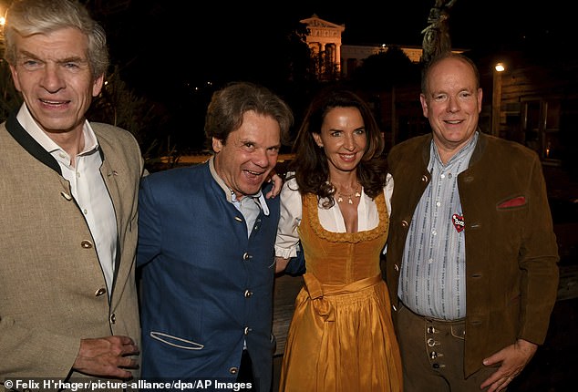 Prince Albert was pictured in Munich on Saturday evening, celebrating Oktoberfest with some friends