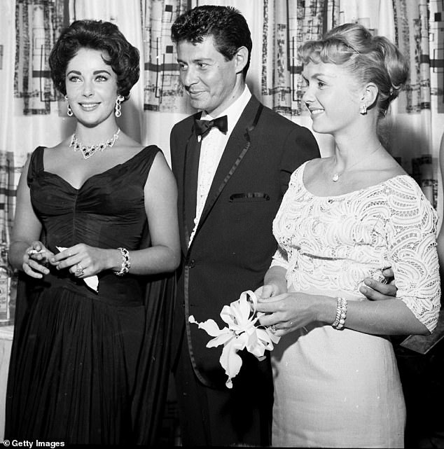 Love triangle: Todd was just a baby when his singer father Eddie Fisher (center) dumped Debbie (right) and ran off with her girlfriend Elizabeth Taylor (left);  the trio is pictured in 1957