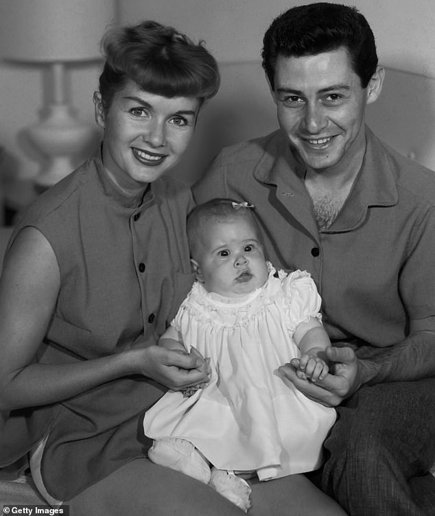 Family Matters: Debbie walked down the aisle anyway and then quickly welcomed Carrie and Todd;  Debbie and Eddie are pictured with baby Carrie in 1956