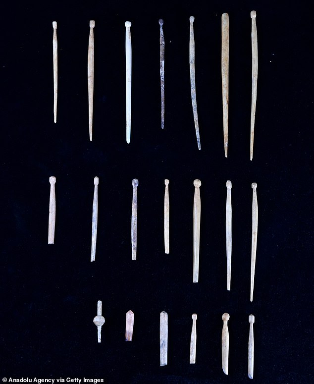 The ancient beauty salon, which the archaeologists said was now 'completely exposed', contained 'several beads belonging to products such as hairpins and necklaces' (above)