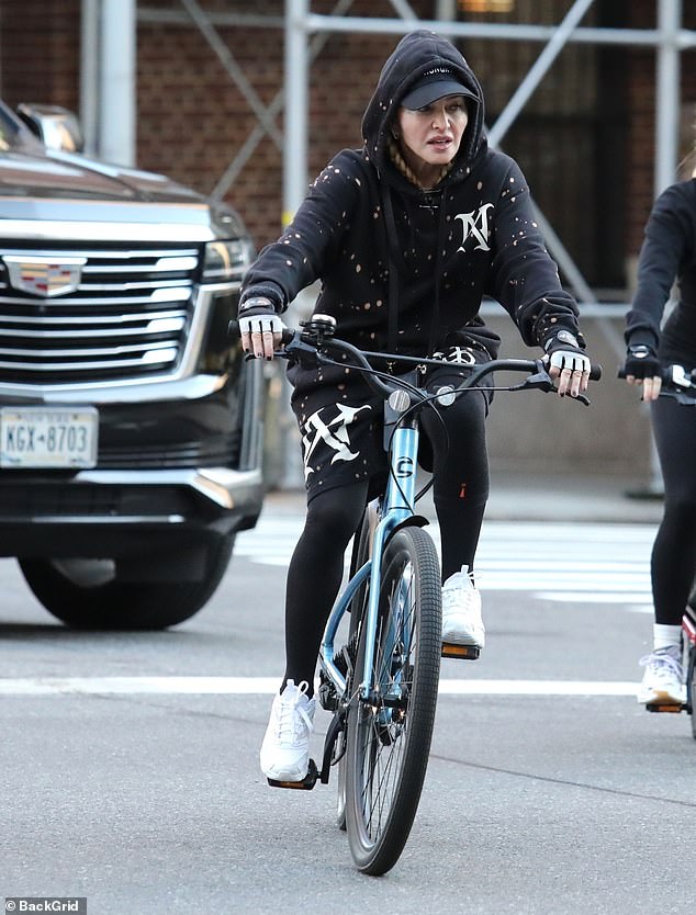 Bike ride: Madge looked in good spirits as she cycled through the Big Apple