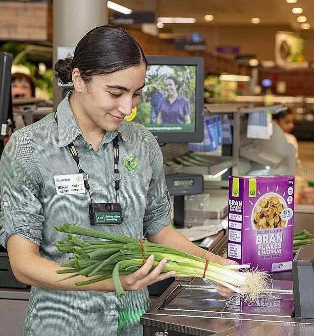 Members of the Retail and Fast Food Workers Union will take part in a two-hour strike to fight for better working conditions (stock image of Woolworths worker)