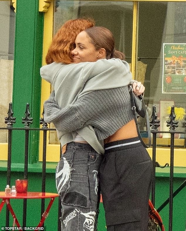 Romance: The football pundit, 38, and the singer, 33, were pictured sharing a warm hug as they said goodbye to each other after a coffee shop trip in London recently