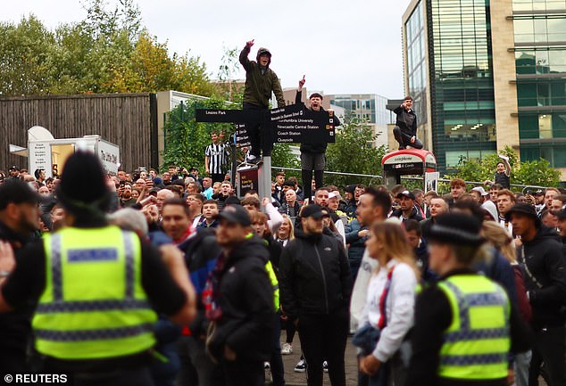 Newcastle fans stood outside the stadium and watched the French supporters enter