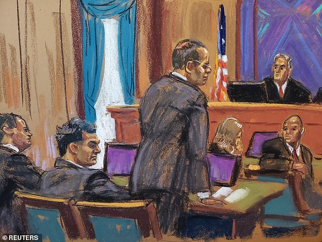 Bankman-Fried, 31, sat in the courtroom on a bench between his two lawyers, wearing a suit with close-cropped hair on the sides