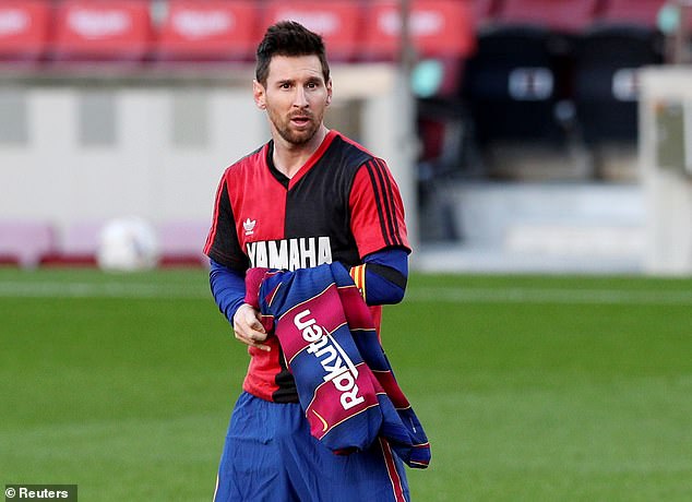 Messi, pictured wearing a Newell's shirt in tribute to the late Diego Maradona in 2020, enjoys a special bond with his boyhood club