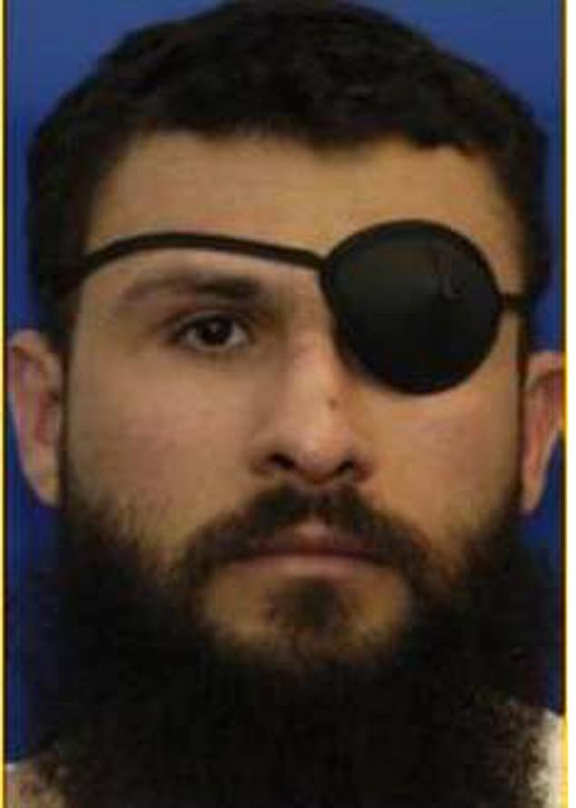 Abu Zubaydah is depicted in a photo of his detention.  He has been held in Guantanamo since 2006