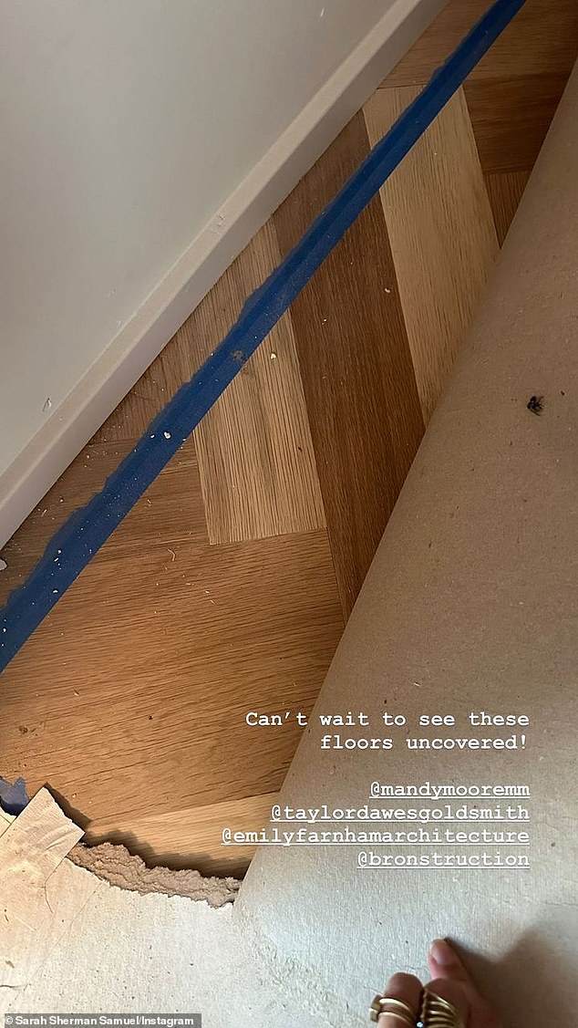 Ongoing: Samuel wrote: 'I can't wait to see these floors exposed' with a shot of the work in progress, with wooden floor panels protected by a layer of covering during the construction project