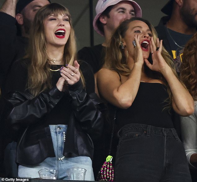 Prized company: Ensconced in a VIP box this weekend, Taylor, 33, ecstatically cheered on Travis amid a thicket of friends, including Blake Lively (right)