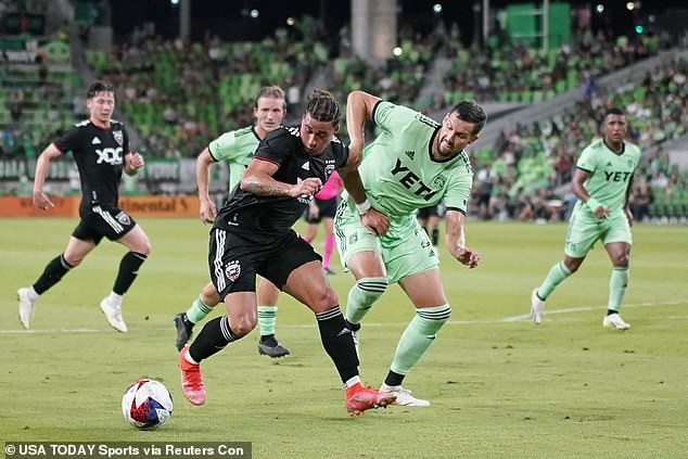 DC United forward Erik Hurtado (L) and Hedges battle for the ball during the second half