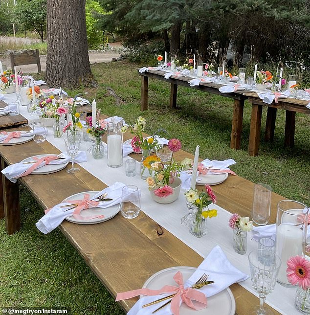 Megan's vision included many bright flowers along the center of the table in various vases