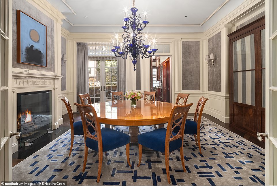 Behind this is a dining room - complete with another fireplace - and a servants' room with a staircase connecting it to the kitchen below