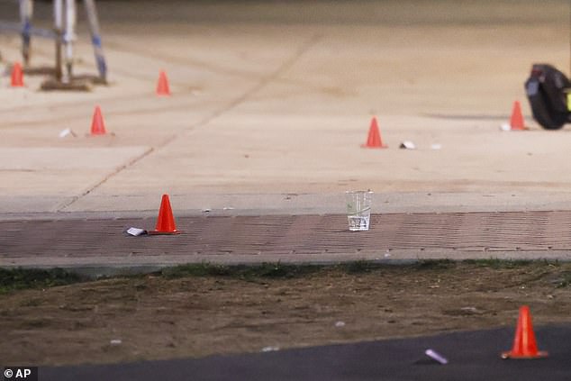 Evidence markers are pictured outside a building at Morgan State University