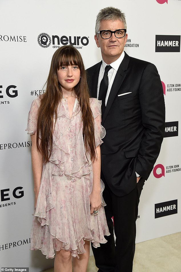 Hanging out with dad: Angelica pictured with her art dealer father Jay Jopling in 2017