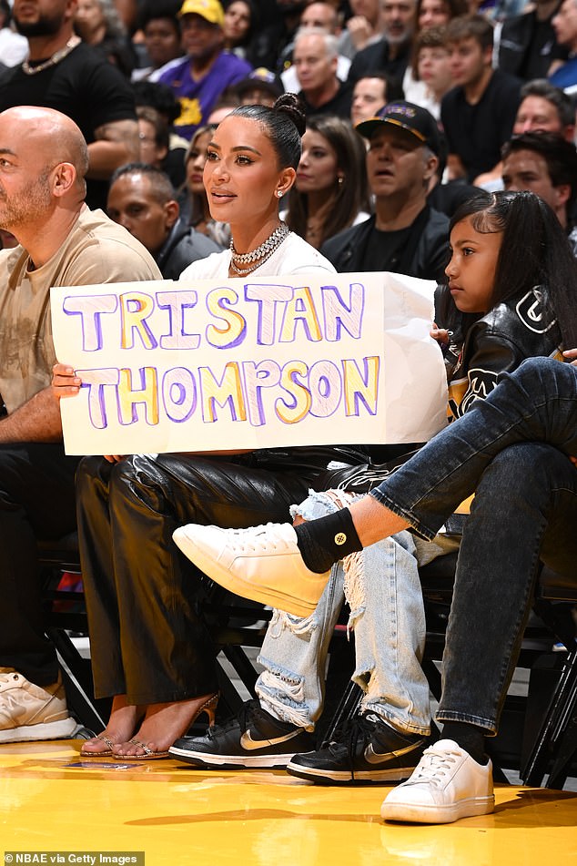 Biggest fan: But Kim, 42, is now rushing to the basketball player's defense, admitting he's a 'really good person' (pictured at his basketball game in May)