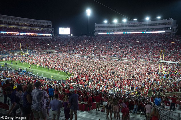 The school was fined $100,000 by the SEC for fans who rushed the field after Saturday's win