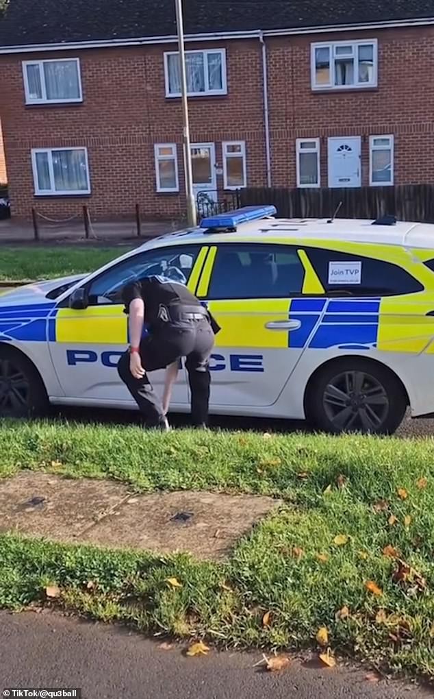 The officer then agrees to pick up the scabs and asks the cameraman not to yell at him