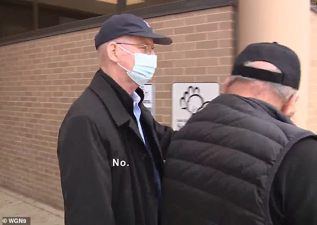 Bakk, who was previously confronted by his neighbors and the media, is seen leaving the court