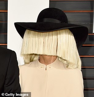 Who is that girl?  Sia became better known for her disguises, but occasionally showed her face (pictured in 2015)