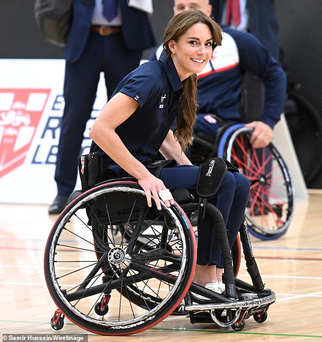 Ditching the smart looks today, Kate Middleton opted for a tracksuit and headed to Hull to meet Disability Rugby League players, even hopping into the wheelchair to play a game