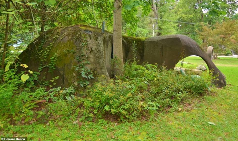 The one-acre estate also includes a guest house, which can be seen above