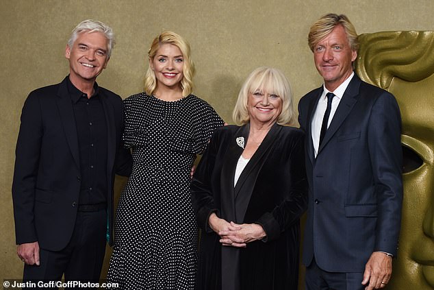 Keeping in touch: Phil and Holly pictured with Richard and Judy in 2018