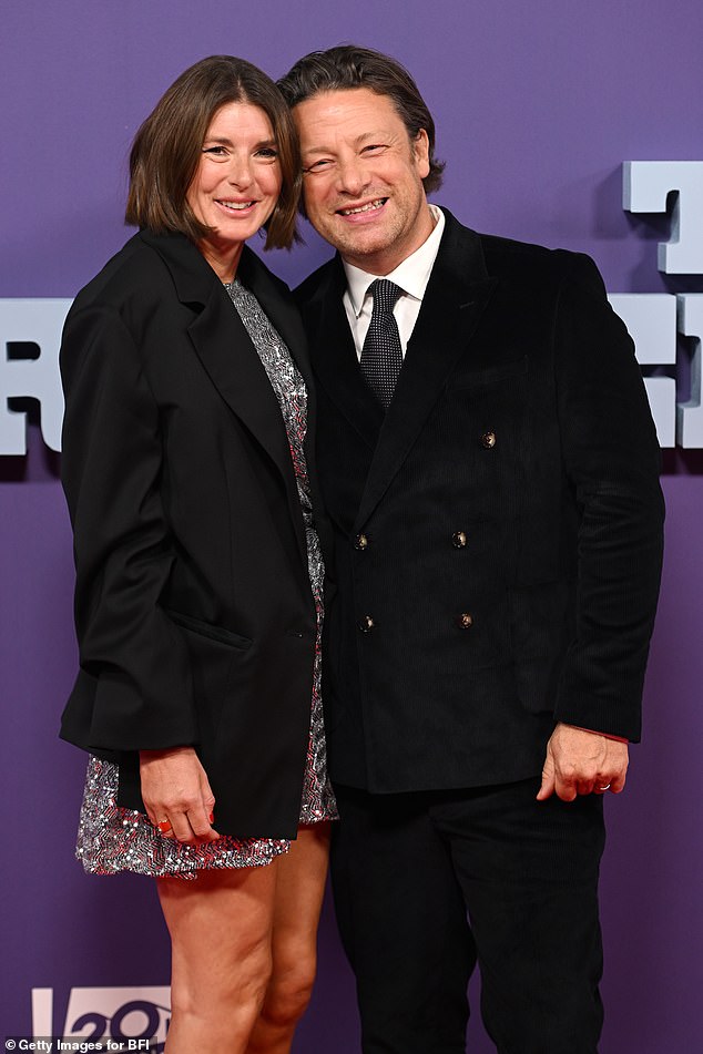 Couple: Jools and Jamie Oliver smiled for a photo on the red carpet