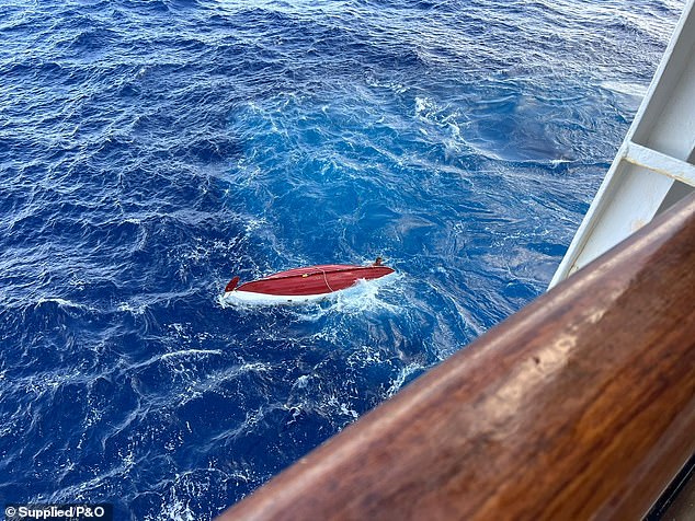 Mr. Robinson built the 23-foot boat he used to cross the Pacific Ocean (pictured, Mr. Robinson's boat from the P&O ship)