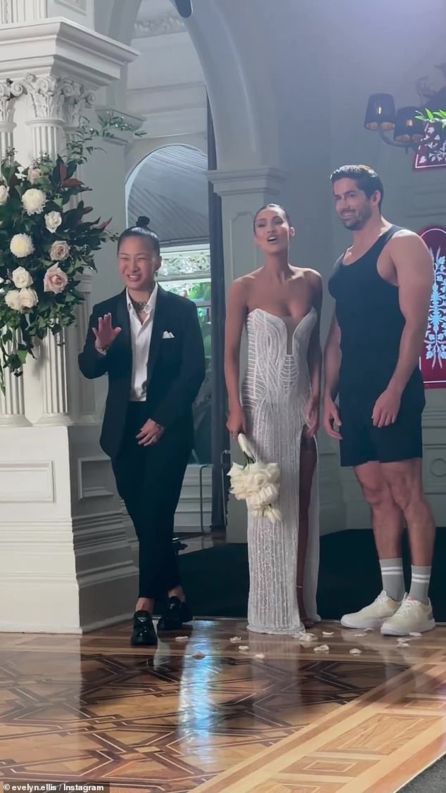 Evelyn tried on wedding dresses during a photo shoot for YD's Suit Up campaign