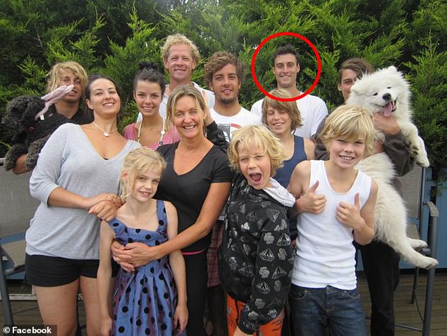 Throwback photo: Sam and Tom De Konin (photo front right) at a family gathering, with stepbrother Charlie (back right)