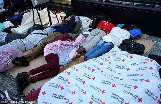 Historic landmarks like the Roosevelt Hotel (pictured outside in August) have been transformed into migrant shelters, with families being prioritized while refugees wait for shelter