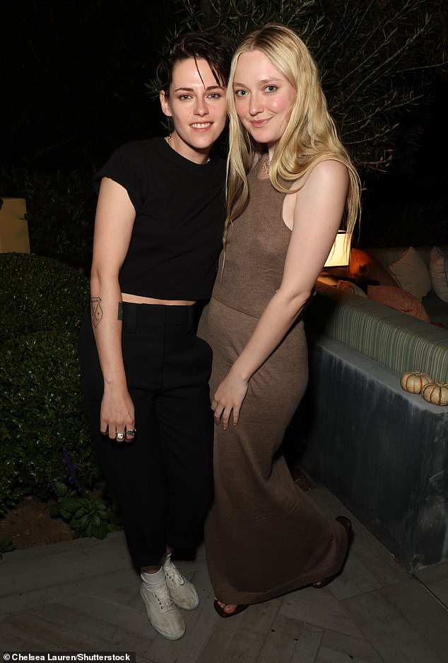 Reunited!  Kristen's Twilight co-star, actress Dakota Fanning, 29, was also in attendance.  The blonde beauty looked ready for fall in a beige top and matching maxi skirt