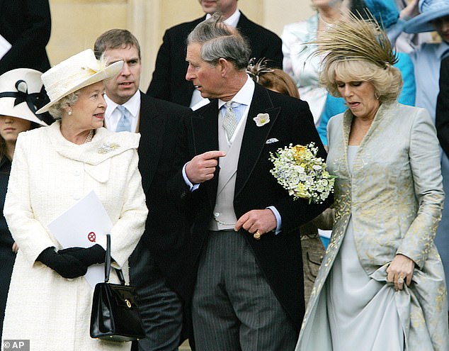 The Queen was unable to attend Charles' wedding because the Church of England discourages divorce.  But she attended the blessing at St. George's Chapel and is pictured here as they left