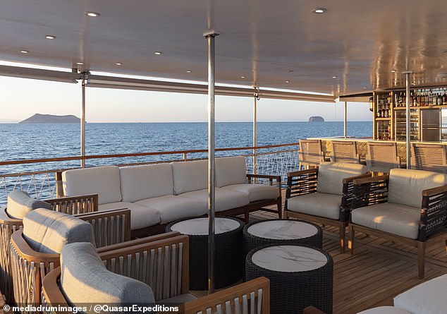 Previously there were only two red chairs on the deck and now twelve guests can lounge on the sofas