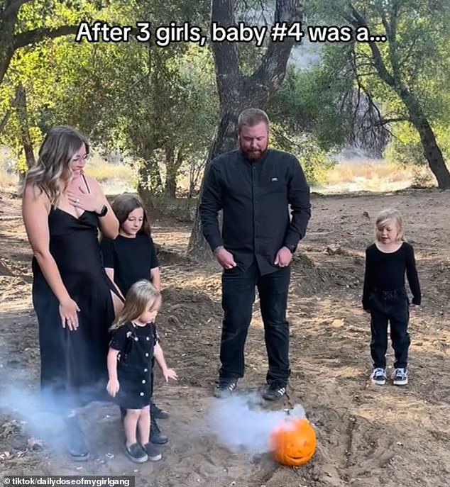 The mother struggled to hide her frustration when she saw the hint of pink smoke that indicated she was having another daughter, as she complained about 'why' she had to have 'another girl'