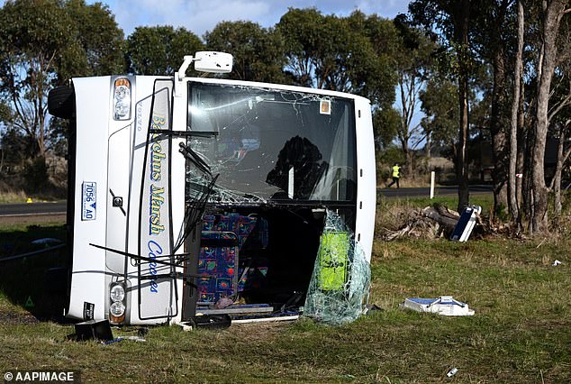 The bus flipped onto its side after the lorry crashed into it in Eynesbury, 56km from Melbourne, trapping many students inside