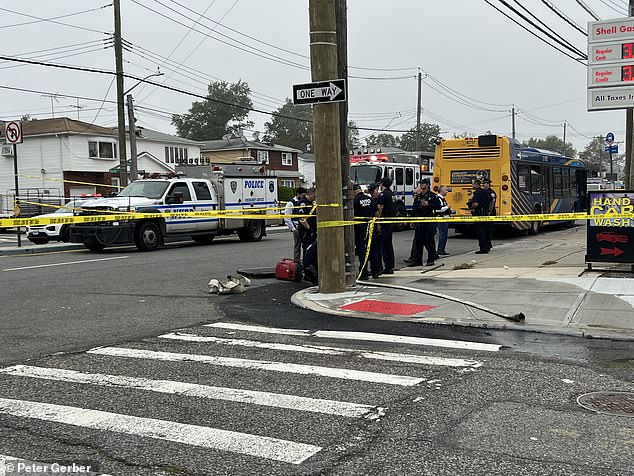 The NYPD's emergency services unit was pictured at the scene looking under vehicles in the area as they searched for the weapon.