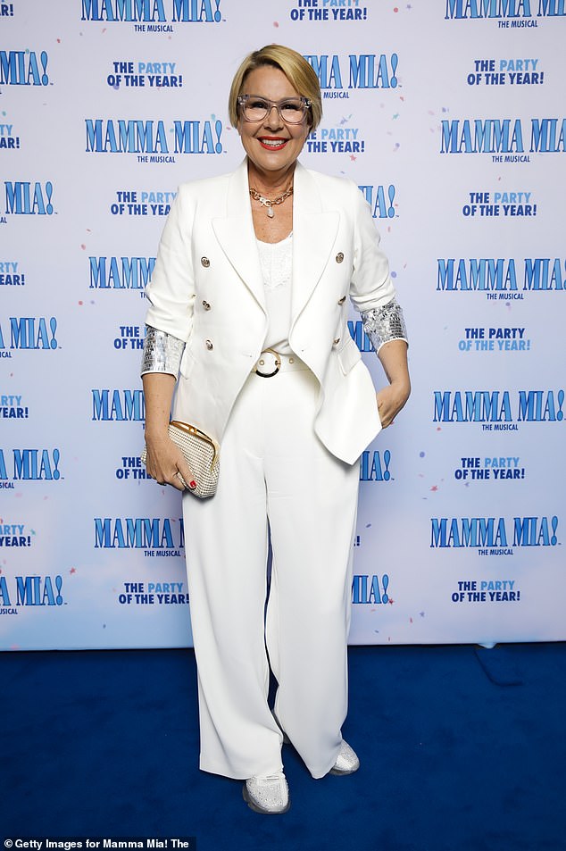 I'm A Celebrity host Julia Morris opted for a similar approach in an all-white ensemble that included a blazer, trousers and shirt