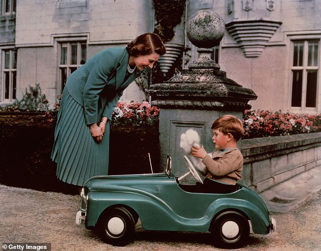 King Charles was photographed inside a three-year-old pedal car with the Queen at Balmoral in 1952