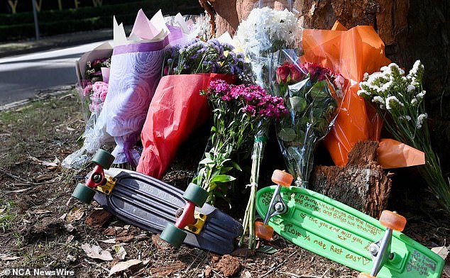 The crash site was turned into a makeshift memorial on Saturday