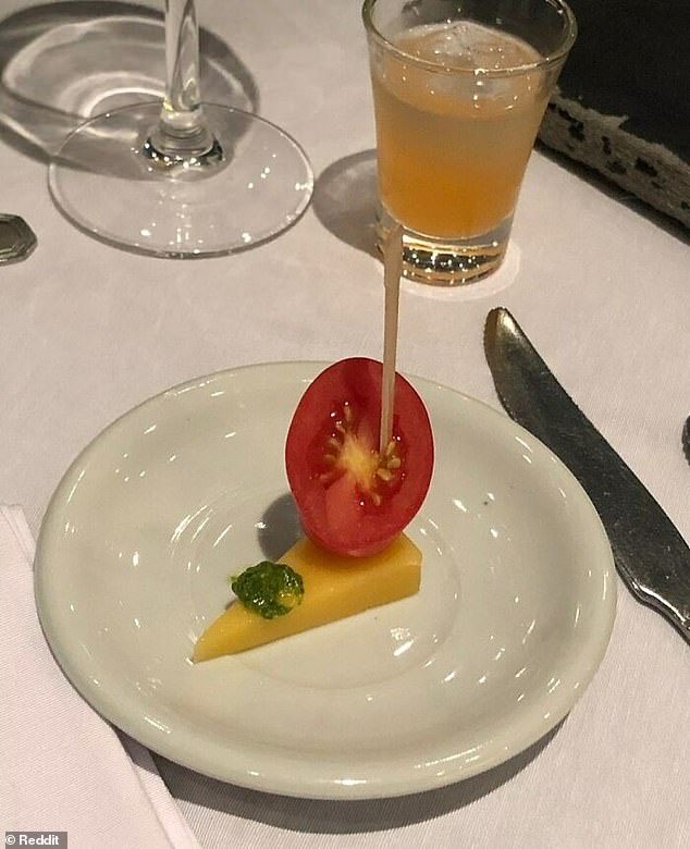 One Redditor, who goes by 'mortiphago' said they ordered the salad at 'the nicest restaurant in town' and shared a photo of some tomato and cheese with a green substance.